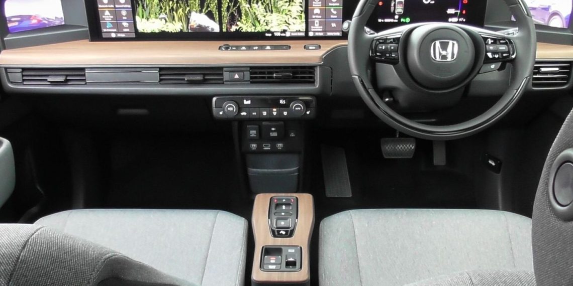 electric vehicle interior showing software dashboard display