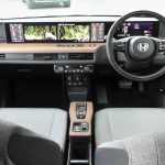 electric vehicle interior showing software dashboard display