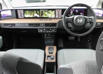 electric vehicle interior showing software dashboard display