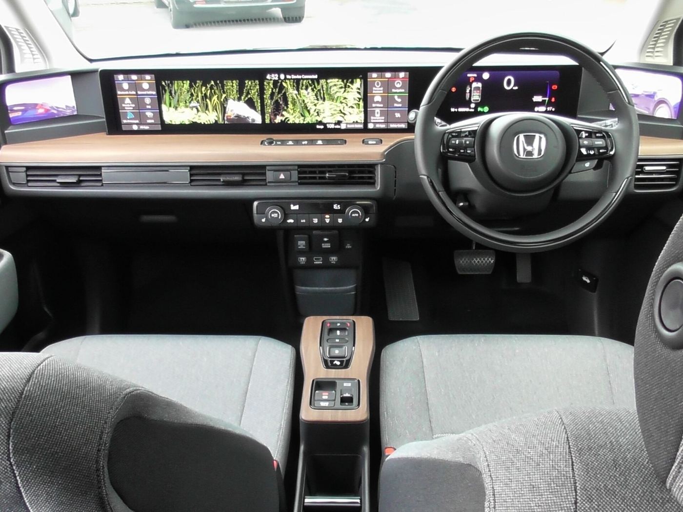 electric vehicle interior showing software dashboard display