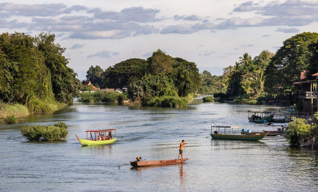 Fishing boats on the Mekong river at dawn