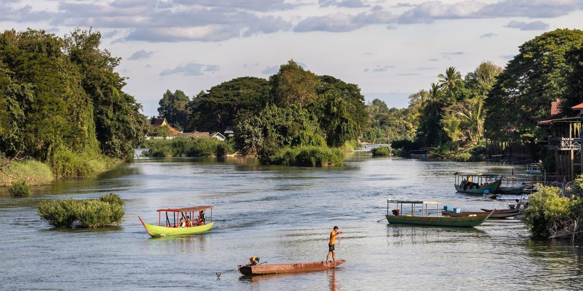 Fishing boats on the Mekong river at dawn